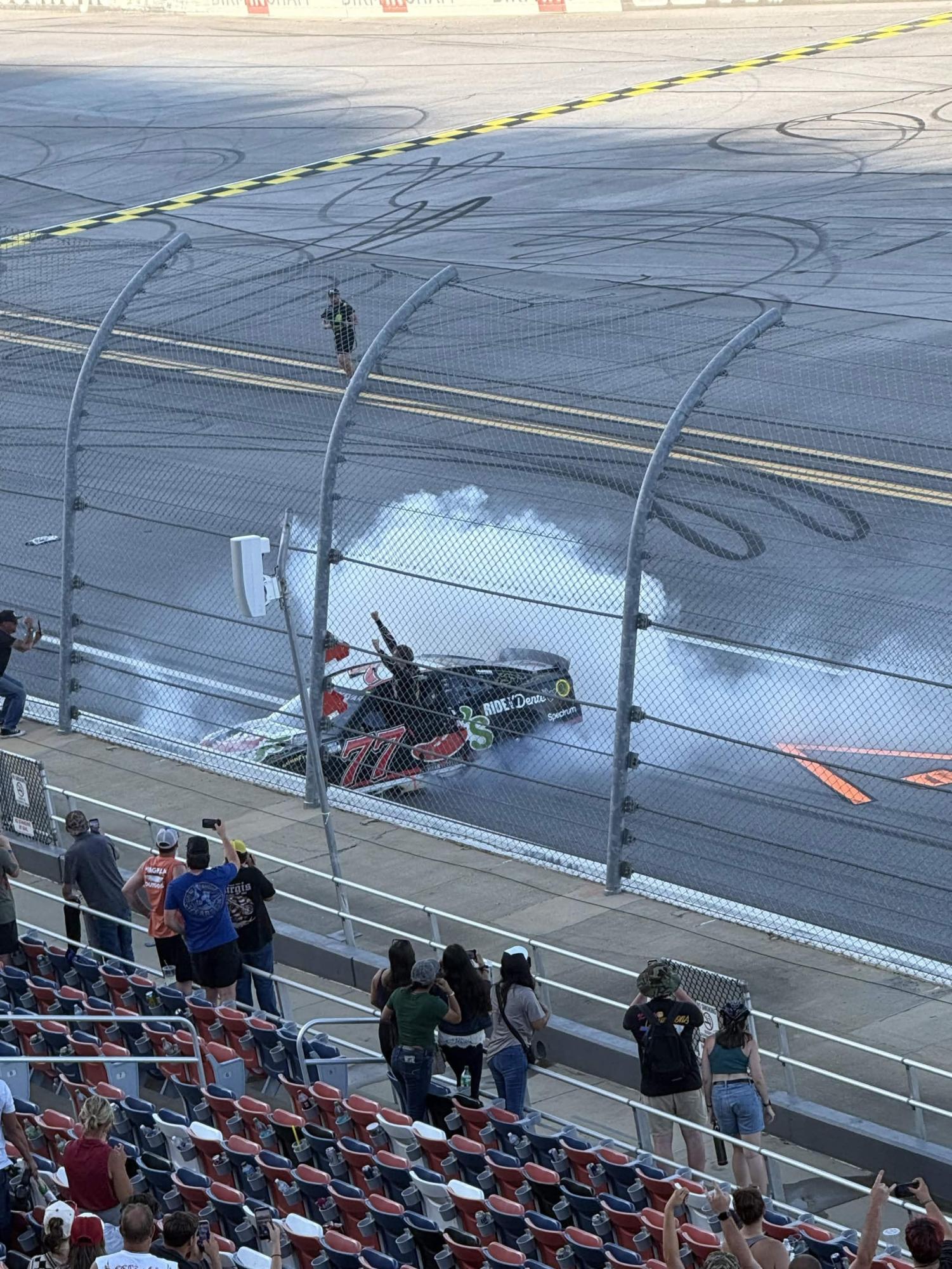 Carson Hocevar (77) celebrates after claiming victory in the 2026 Jack's Links 500 at Talladega Superspeedway
